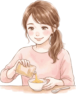ママがほっとした笑顔で、パウチのベビーフードを小さな器に移している絵