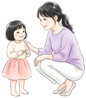 しゃがんで子どもと話しながらチャイルドシートの位置を考えるママ